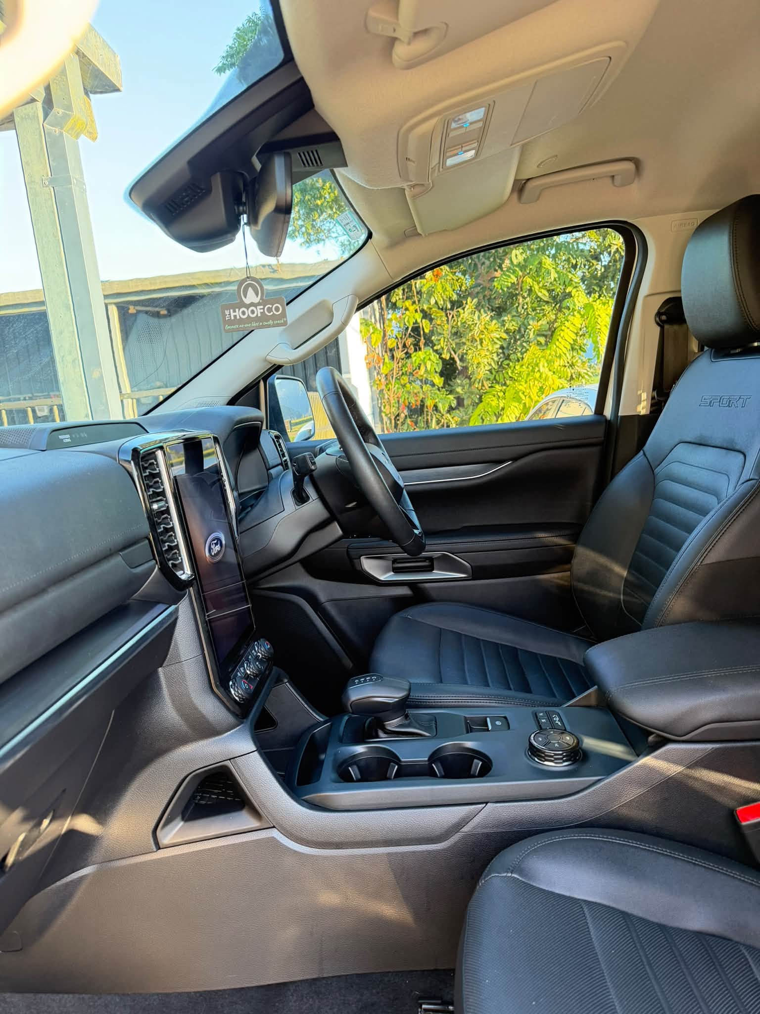 Brand New Again Mobile Detailing owner detailing a car in Cairns